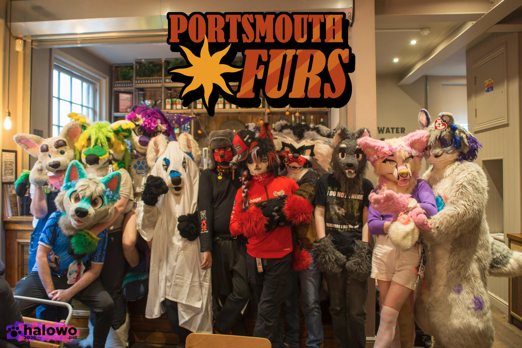 A group photo with the PortsmouthFurs logo at the top of the image
